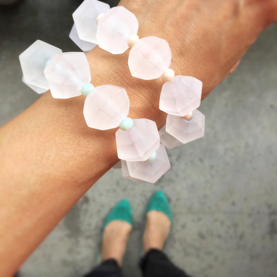 Glacé Bracelets are chunky bracelet with frosted acrylic beads and pastel coloured crystals. Shown on wrist.