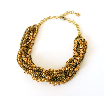 Tangle Chain Necklace by MoonRox Jewellery & Accessories features multiple brass chains interwoven to form a bold necklace. Made in Toronto, Canada.