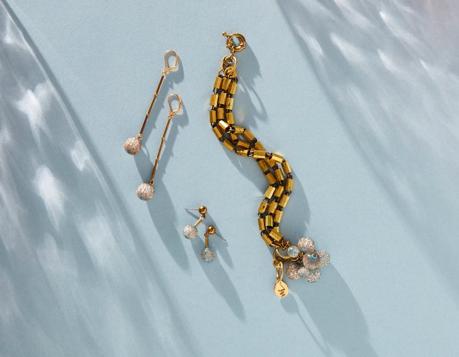 Last Dance Studs shown with Last Dance Bracelet and Earrings. This series mixes brass and lucite beads filled with sparkles.