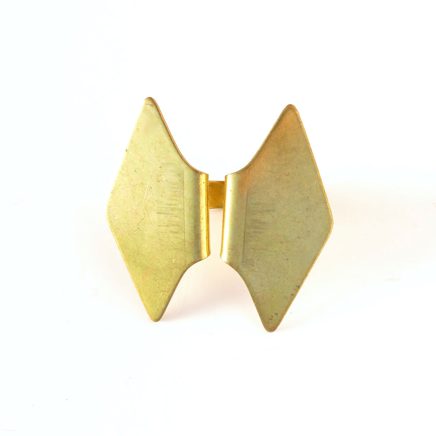 The Monarch Rings are vintage brass rings that are bold, shapely, geometric forms. Size is adjustable. Available in limited quantities.