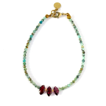 Nefertiti Bracelet by MoonRox is a beaded bracelet with African turquoise and garnet.