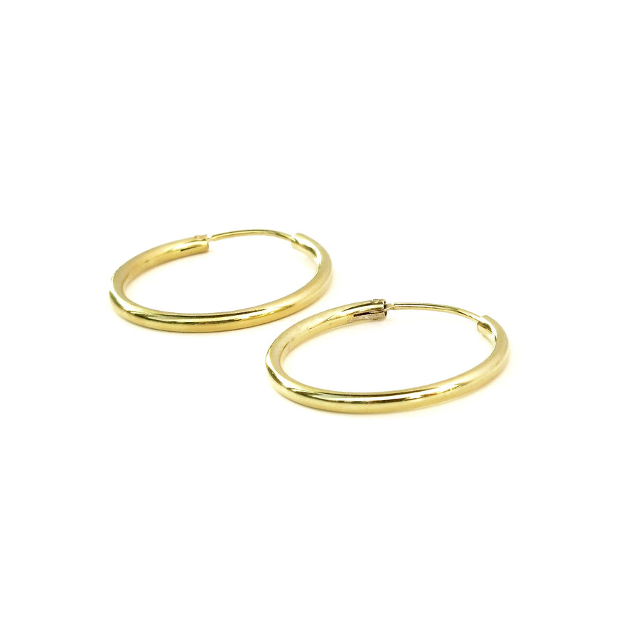 Simple Hoop Earrings are classic sterling silver hoops. These are gold plated.