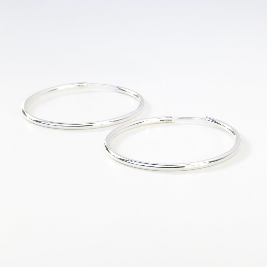 40mm Simple Hoop Earrings are classic sterling silver earrings.