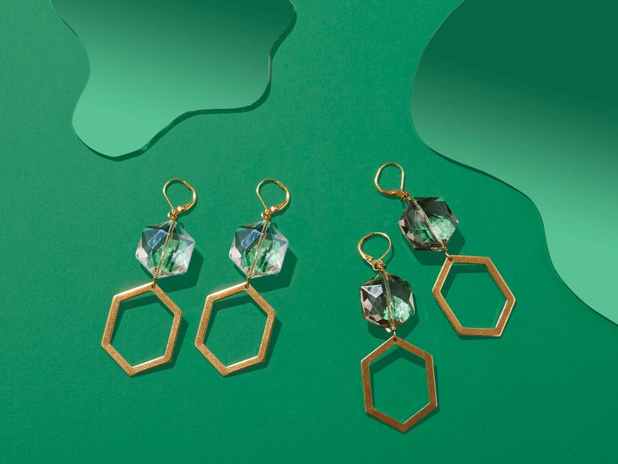 Under the Moonlight Earrings by MoonRox Jewellery & Accessories feature a combination of shiny crystal and brass polygons. Choose from two colours. Made in Toronto, Canada.