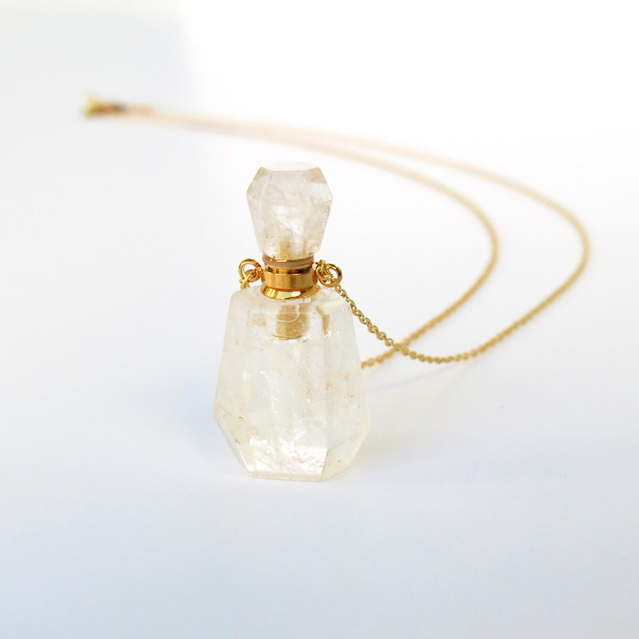 Aroma Necklace by MoonRox Jewellery & Accessories features pendant that is a small functioning bottle made of semi-precious stone. Shown in crystal quartz.