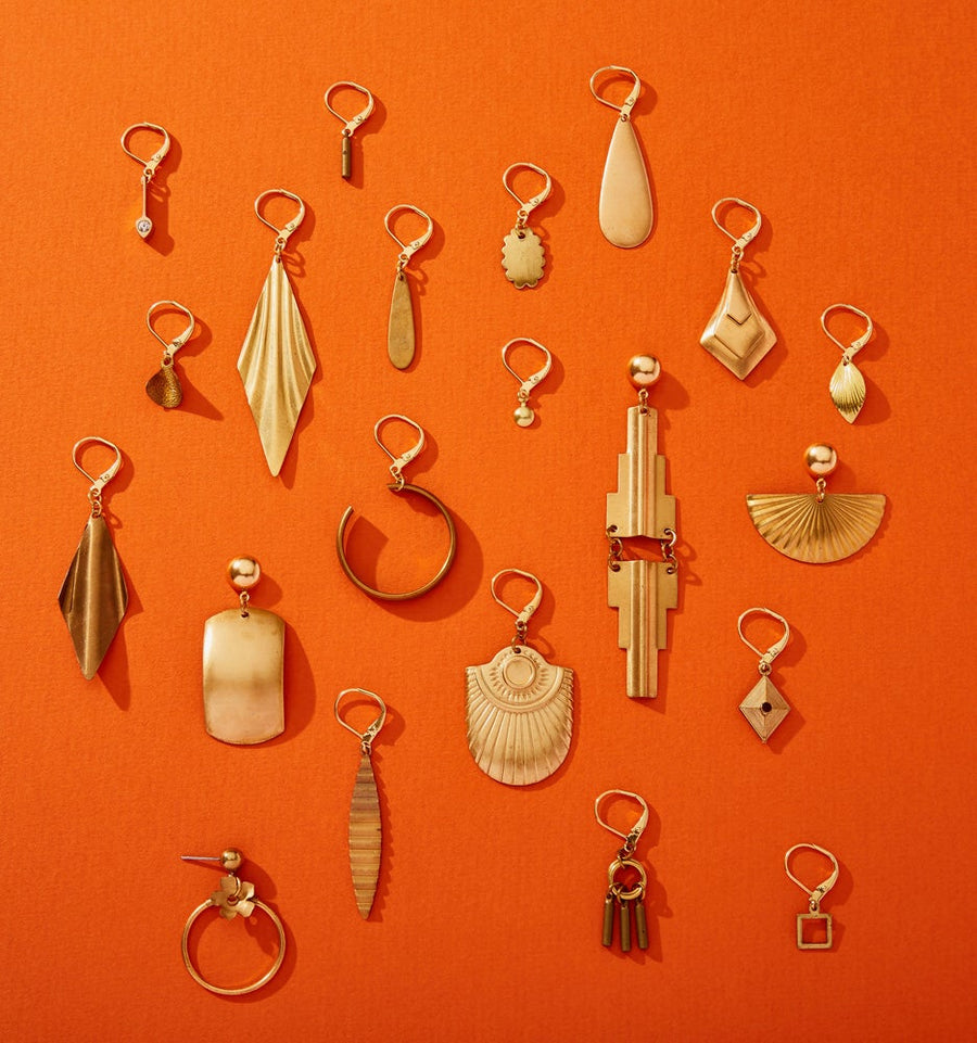 Brass earrings in all different shapes and sizes.
