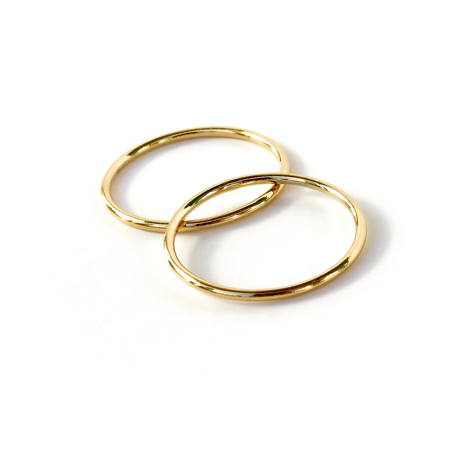 Fine Line Ring is a simple thin gold plated sterling silver band. These very skinny linear rings look good solo as well as stacked with other rings.