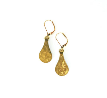 Fragment Earrings feature hammered brass drops hang from lever back ear wires.