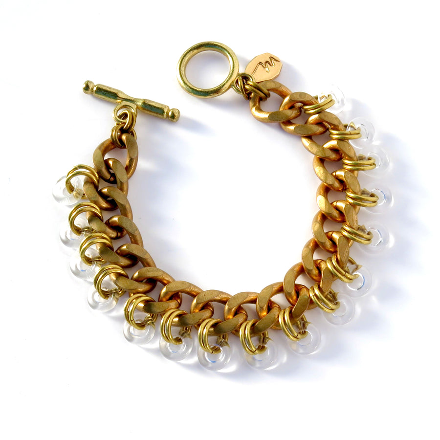 Frizzante Bracelet made with a solid brass chain and lots of glass bubble charms.