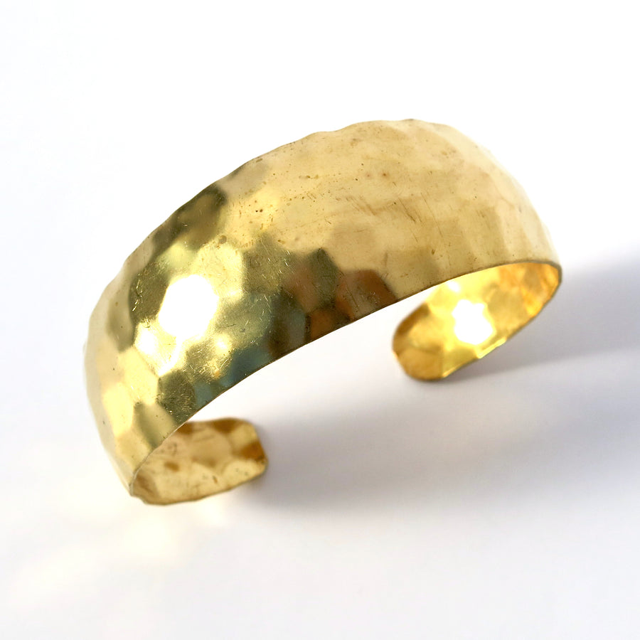 Ground Control Cuff Bracelet is made of brass with a hammered or mottled texture