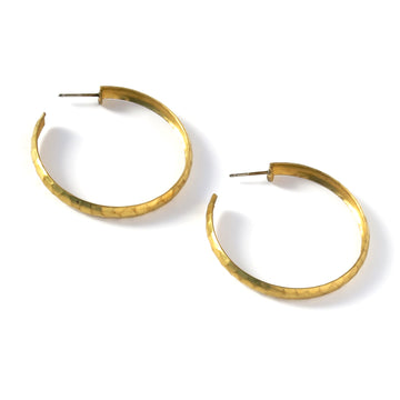 The Ground Control Hoops are made of brass with a hammered or mottled texture.