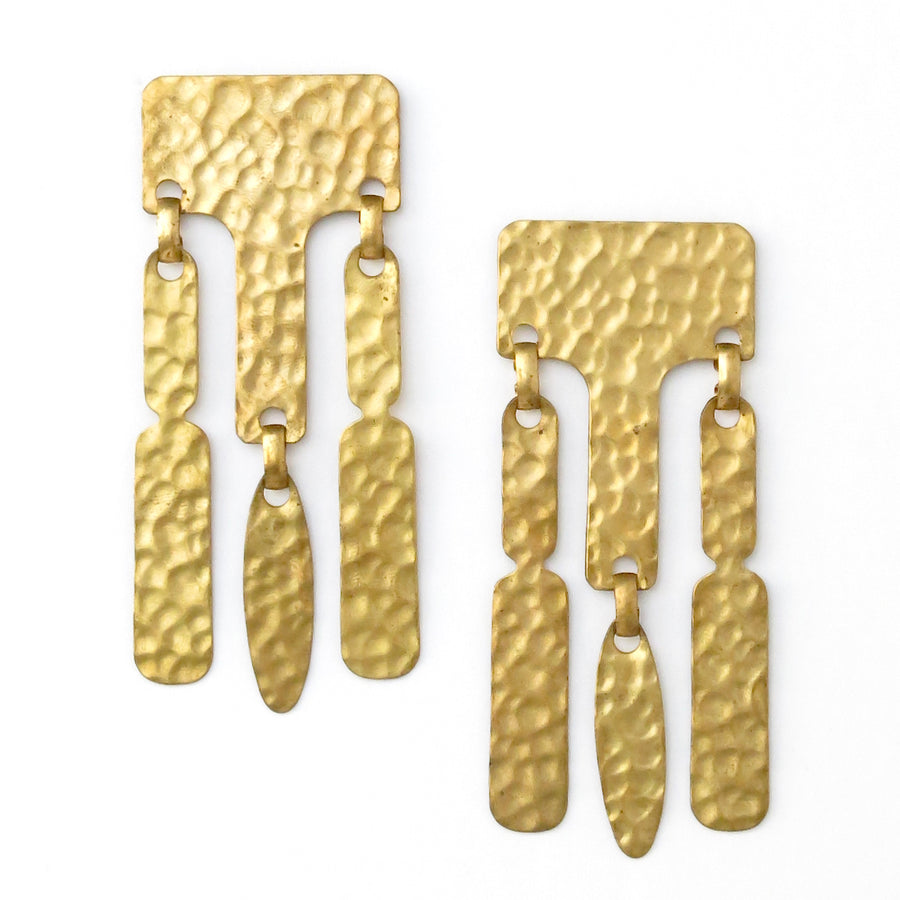 Hera Earrings are large graphic studs with mottled or hammered finish.