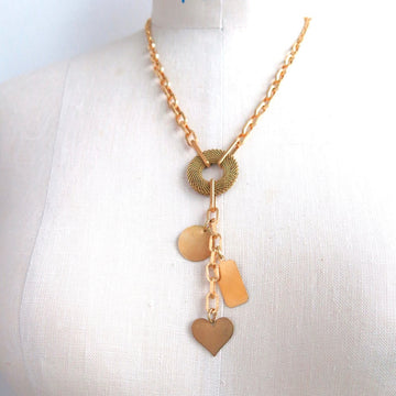 Loves Lost and Found Necklace by MoonRox is a chain lariat with 3 sweet brass charms.