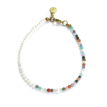 New Meridian Bracelet by MoonRox Jewellery & Accessories  mixes delicate freshwater pearls and fasted semi precious stones. Made in Toronto, Canada.