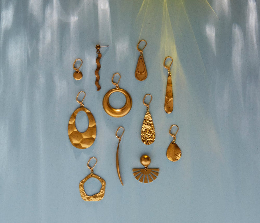A variety of brass earrings by MoonRox Jewellery & Acessories.