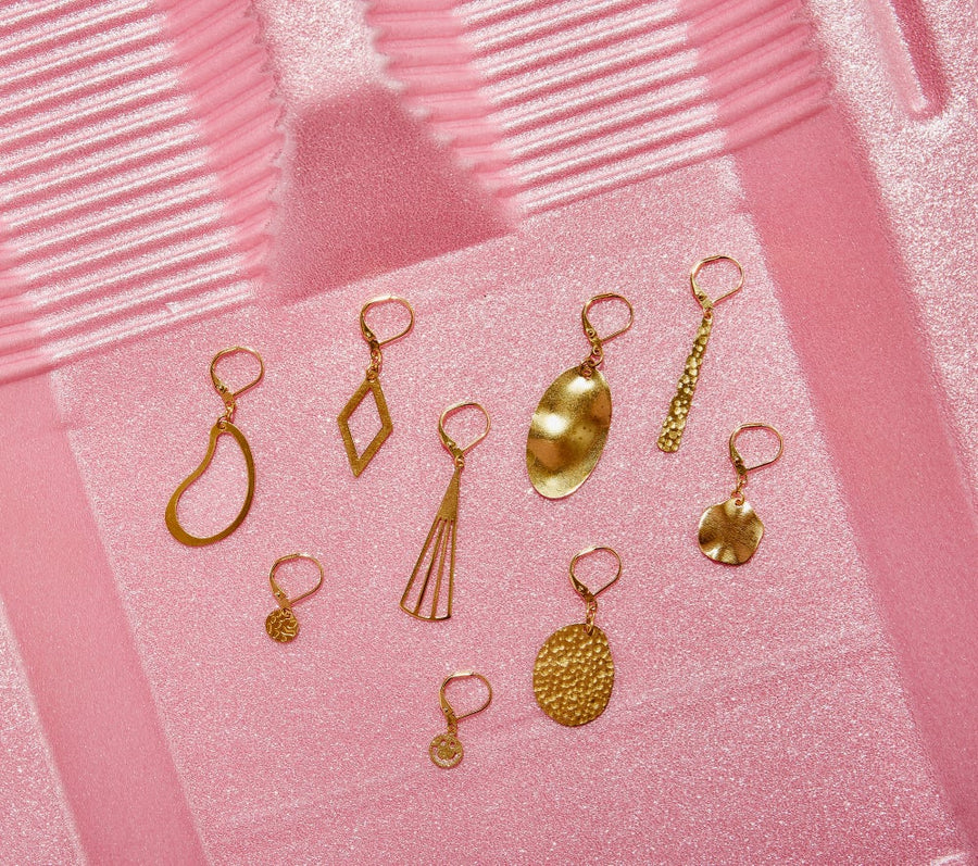 A selection of brass charm earring options from MoonRox Jewellery & Accessories.