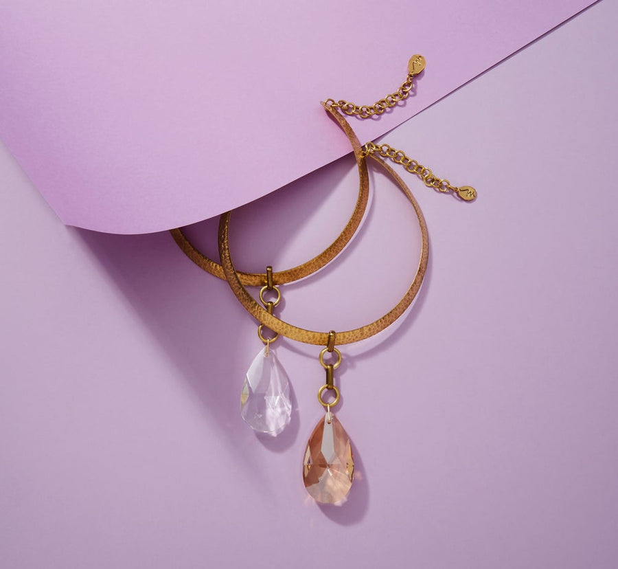 Two colour options for the Halcyon Choker by MoonRox Jewellery & Accessories - A light catching faceted crystal pendant on structured brass choker.