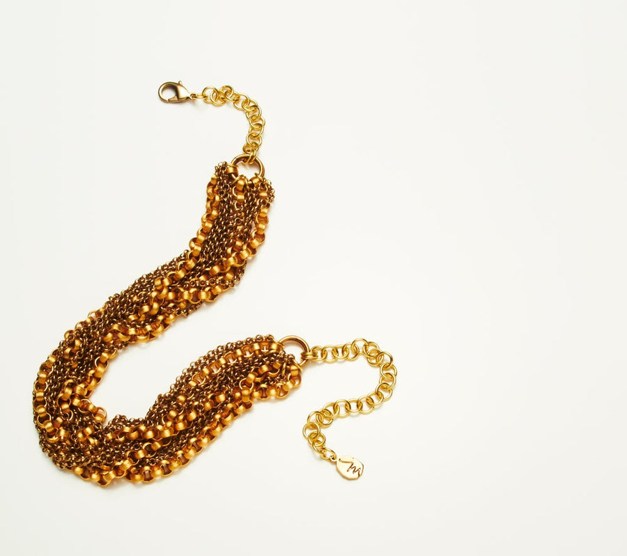 Tangle Chain Necklace by MoonRox Jewellery & Accessories features multiple brass chains interwoven to form a bold necklace. Made in Toronto, Canada. 