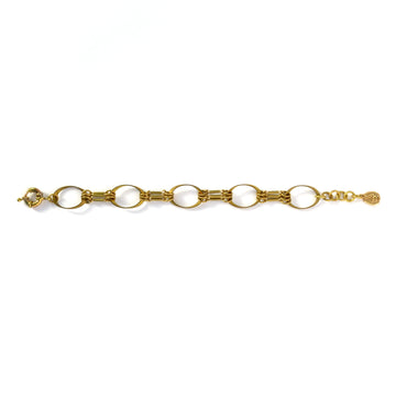 Muse Bracelet by MoonRox Jewellery & Jewellery is a brass bracelet with a mix of oval shapes and linear details.