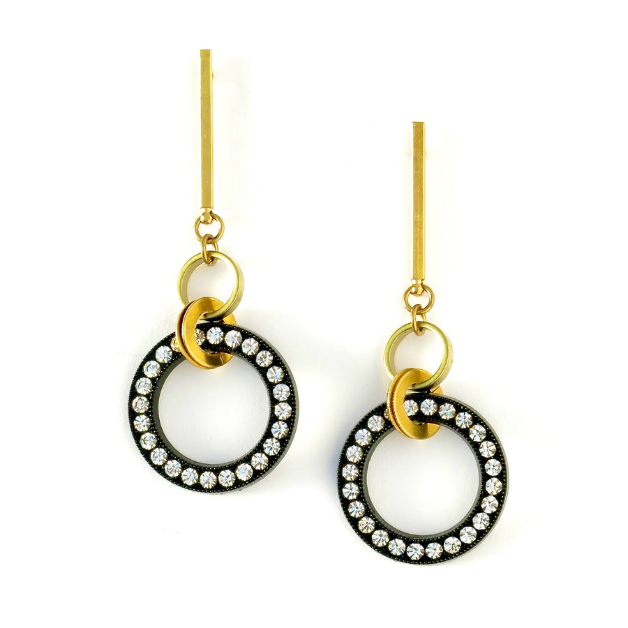 Night Sky Earrings are elongated studs with a ring of rhinestones on black base.