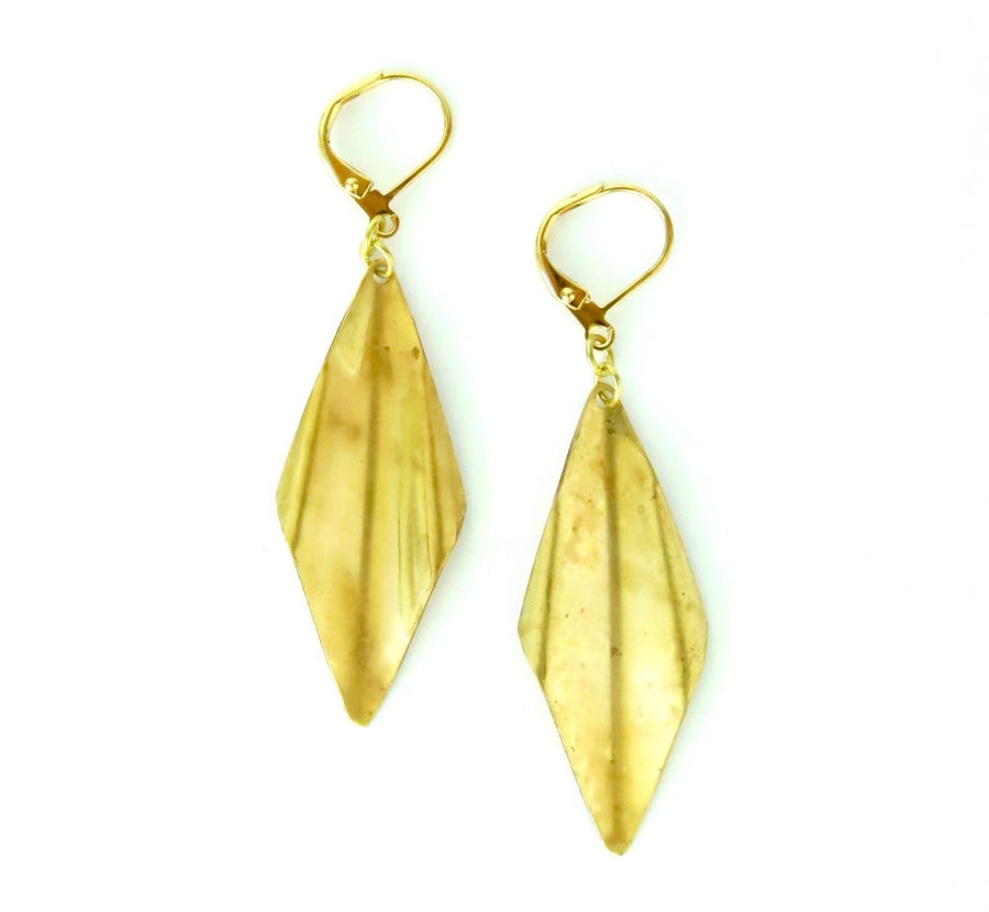 Panache Earrings by MoonRox feature a brass charm with a subtle wave.