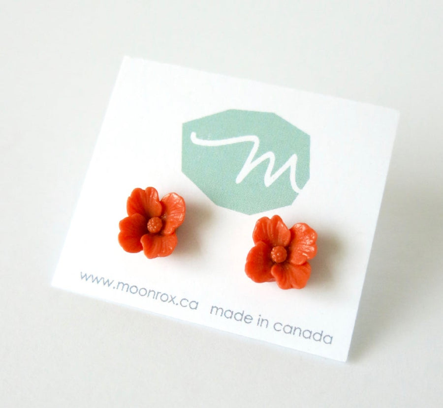 Posy Stud Earrings are pretty flower earrings made of coral coloured vintage celluloid.