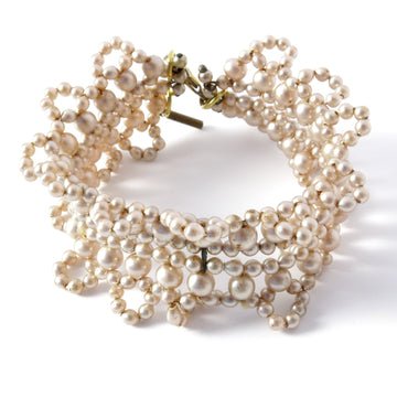 Queen Anne's Lace Bracelet is a vintage glass pearl piece that was made in Japan.