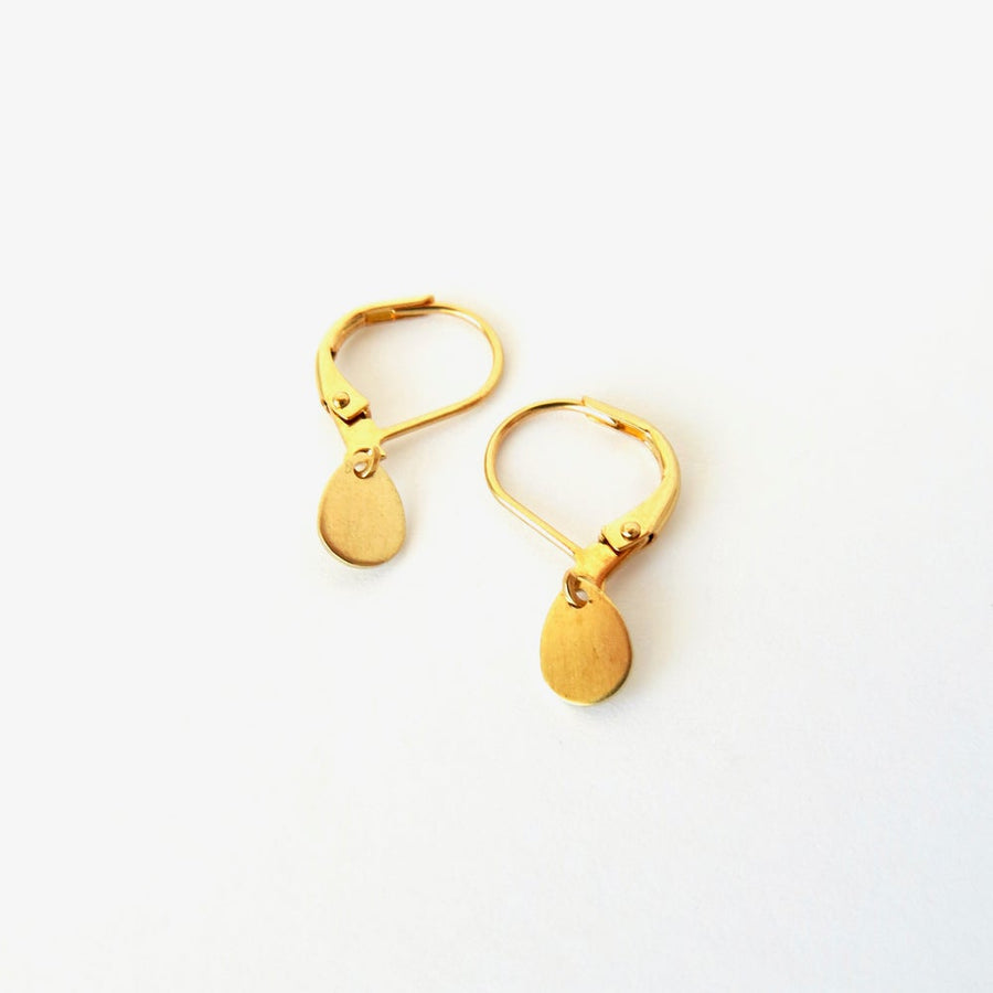 Rainy Day Earrings feature a small dainty brass tear drop charm.