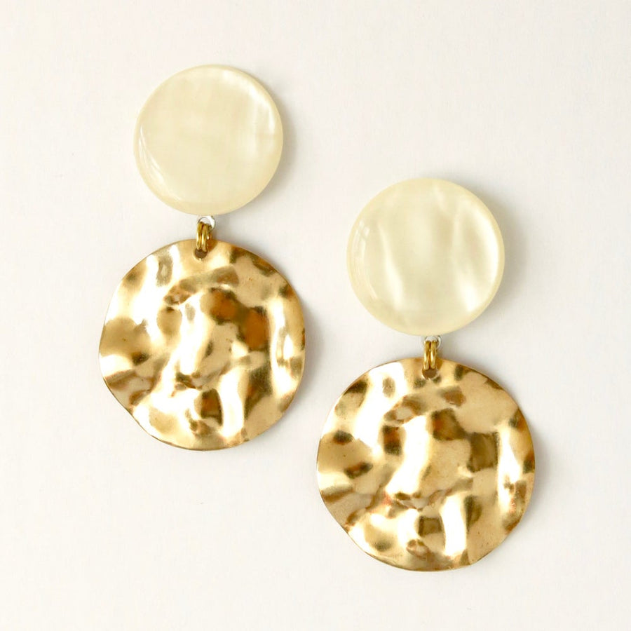 Ripple Effect Stud Earrings by MoonRox Jewellery & Accessories are mottled pearly lucite studs with large textured brass charm suspended below.