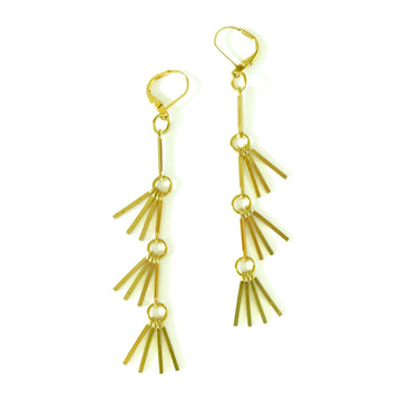 Rising Phoenix Earrings are long dangly earrings with three tiers of brass fringe. Made in Toronto, Canada.