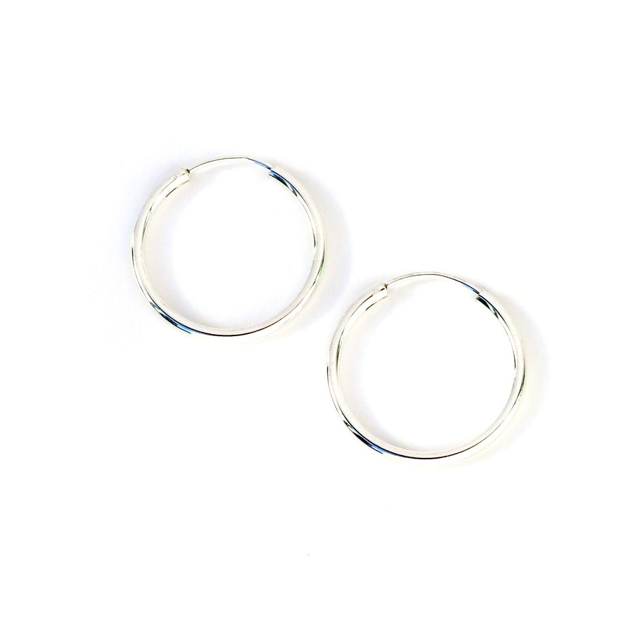 Simple Hoop Earrings are classic sterling silver hoops.