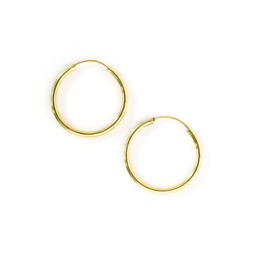 Simple Hoop Earrings are classic sterling silver hoops. These are gold plated.