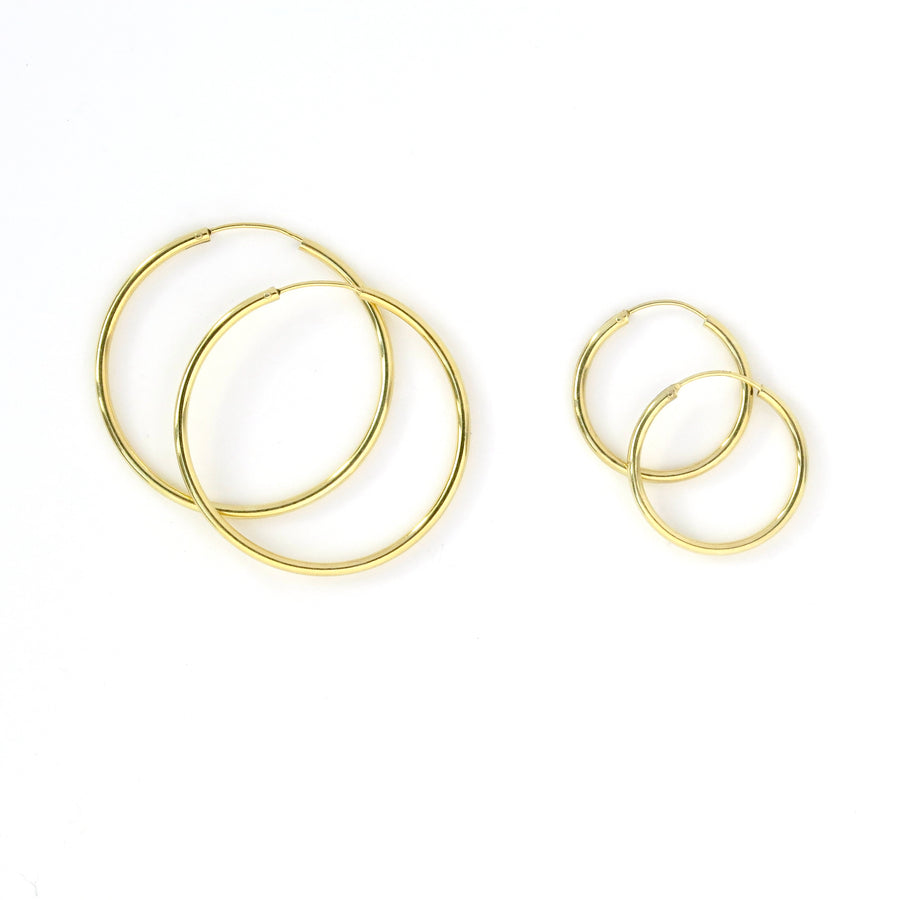 Simple Hoop Earrings are classic sterling silver hoops in 25mm and 40mm options.