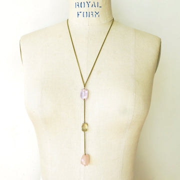 Skipping Stones Necklace is a Y-style lariat with three lovely and substantial semi-precious stones. This Necklace features amethyst, lemon quartz and rose quartz stones.