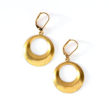 Timeless Earrings are versatile circular brass charm earrings.