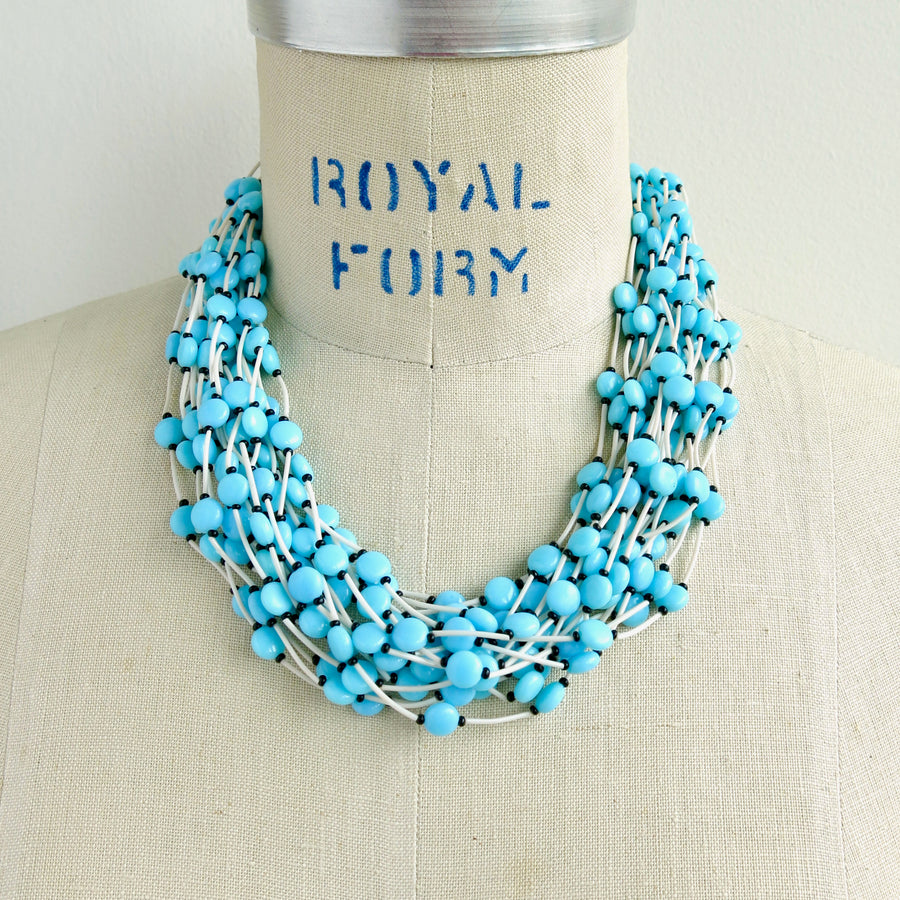 Colourful vintage Tropical Necklace in Ocean Blue colour. This 20 strand statement necklace is lightweight with big impact.  