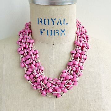 Colourful vintage Tropical Necklace in Orchid Pink. This statement necklace is lightweight with big impact. Channel your inner Barbie!