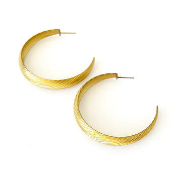 Hatched Hoops curated by MoonRox Jewellery & Accessories - brass hoop studs with hatched texture.