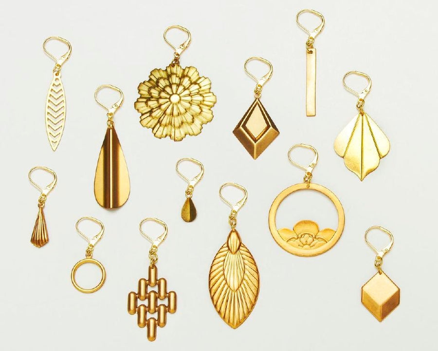 Cubic Earrings by MoonRox Jewellery & Accessories styled with a selection of brass charm earrings 